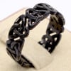 Men's ring with chiseled Celtic knot steel ring