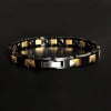 Bracciale da donna in ceramica nera con placca in oro