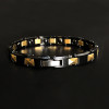 Pulsera de mujer de cerámica negra con baño de oro.