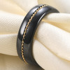 Bague ceramique noire dome ligne acier dore