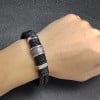 Leren herenarmband met dubbele koordring en stalen magnetische sluiting