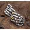 Boucles d'oeilles argent homme tete de mort main de squelette