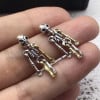 Men's sterling silver skeleton earrings