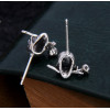 Men's silver earrings with pink skull studs