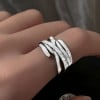 Women's open silver crossed lines ring