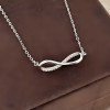 Colgante de cadena de plata con símbolo de infinito de circonitas