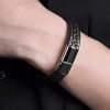 Zweifarbiges geflochtenes Herrenarmband aus Leder mit schwarzer Stahlschließe