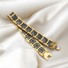 Bracciale da uomo in ceramica nera con placca in oro