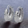 Orecchini creoli da donna in argento martellato