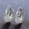 Women's silver hammered creole earrings