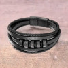 Bracciale da uomo in pelle con anelli multicavo in acciaio