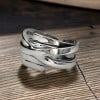 Women's open silver crossed lines ring