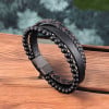 Pulsera de hombre de piel trenzada con múltiples cintas y cierre de acero