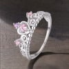 Rhodium silver ring with pink zirconium crown