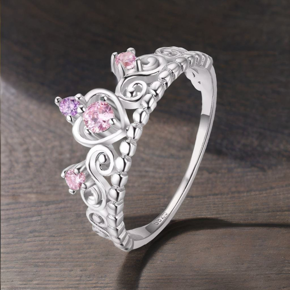Rhodium silver ring with pink zirconium crown
