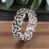 Men's ring with chiseled Celtic knot steel ring