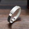 Gepersonaliseerde herenarmband van rubber met stalen pantser