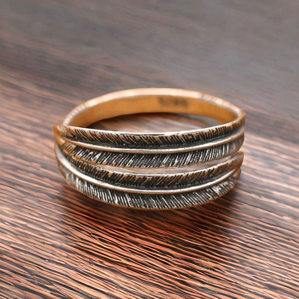 Anillo pluma hombre online