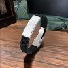 Personalized men's black rubber bracelet with 2 lines engraving