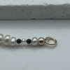 Collana di perle d'acqua dolce in onice nero con chiusura in oro laminato