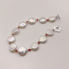 Bracciale con perle d'acqua dolce barocche, chiusura a T in argento da 12 mm