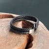 Herenarmband met dubbel gevlochten leren banden en magnetische sluiting