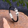Bracelet homme cuir tresse tete de mort acier