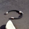 Bracelet homme cuir tresse tete de mort acier