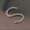 Bracciale da Uomo in Acciaio con Catena Intrecciata