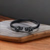 Bracelet jonc acier biker homme cable fermoir tete de dragon