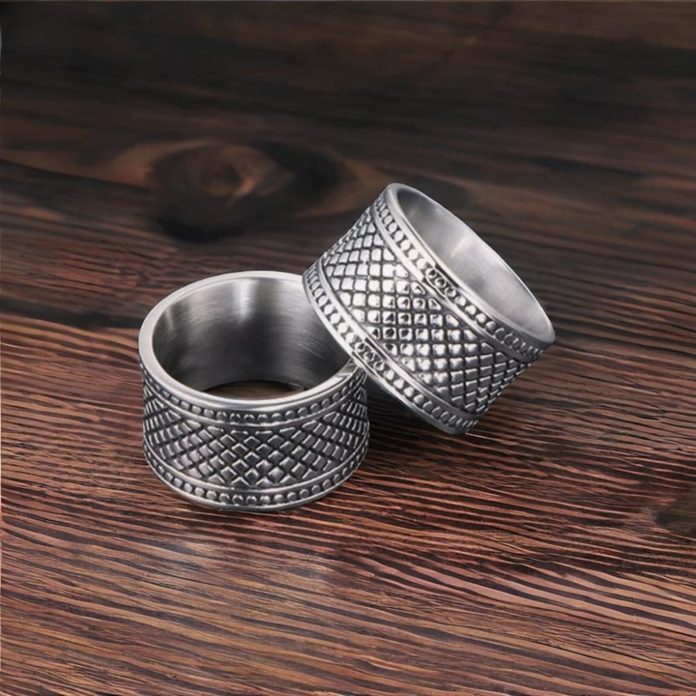 Vente Bague homme en acier doré et argenté à motif ajouré