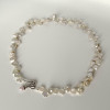 Collana di perle coltivate barocche con fiori e chiusura in argento