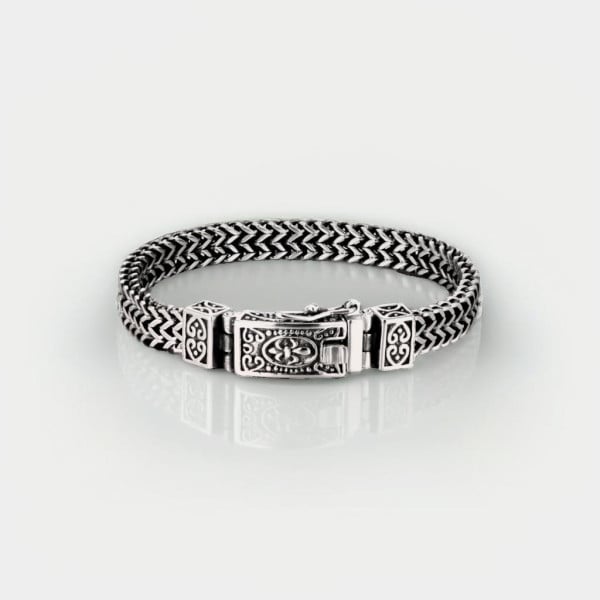Pulsera biker de hombre con cadena trenzada de flor de lis