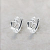 Orecchini in argento per uomo e donna, creoli a corona incrociataOrecchini in argento per uomo e donna, creoli a corona incrocia