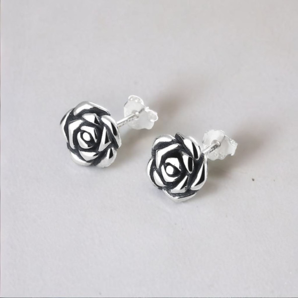 Orecchini a perno in argento 925 con fiore rosa