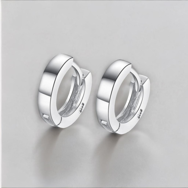 Orecchini a cerchio in argento rodiato per uomo e donna