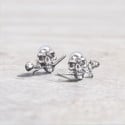 Men's silver earrings with pink skull studs