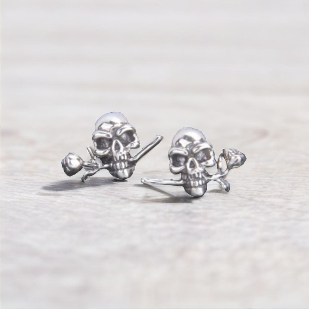 Men's silver earrings with pink skull studs