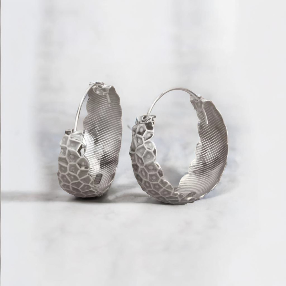Women's silver hammered creole earrings
