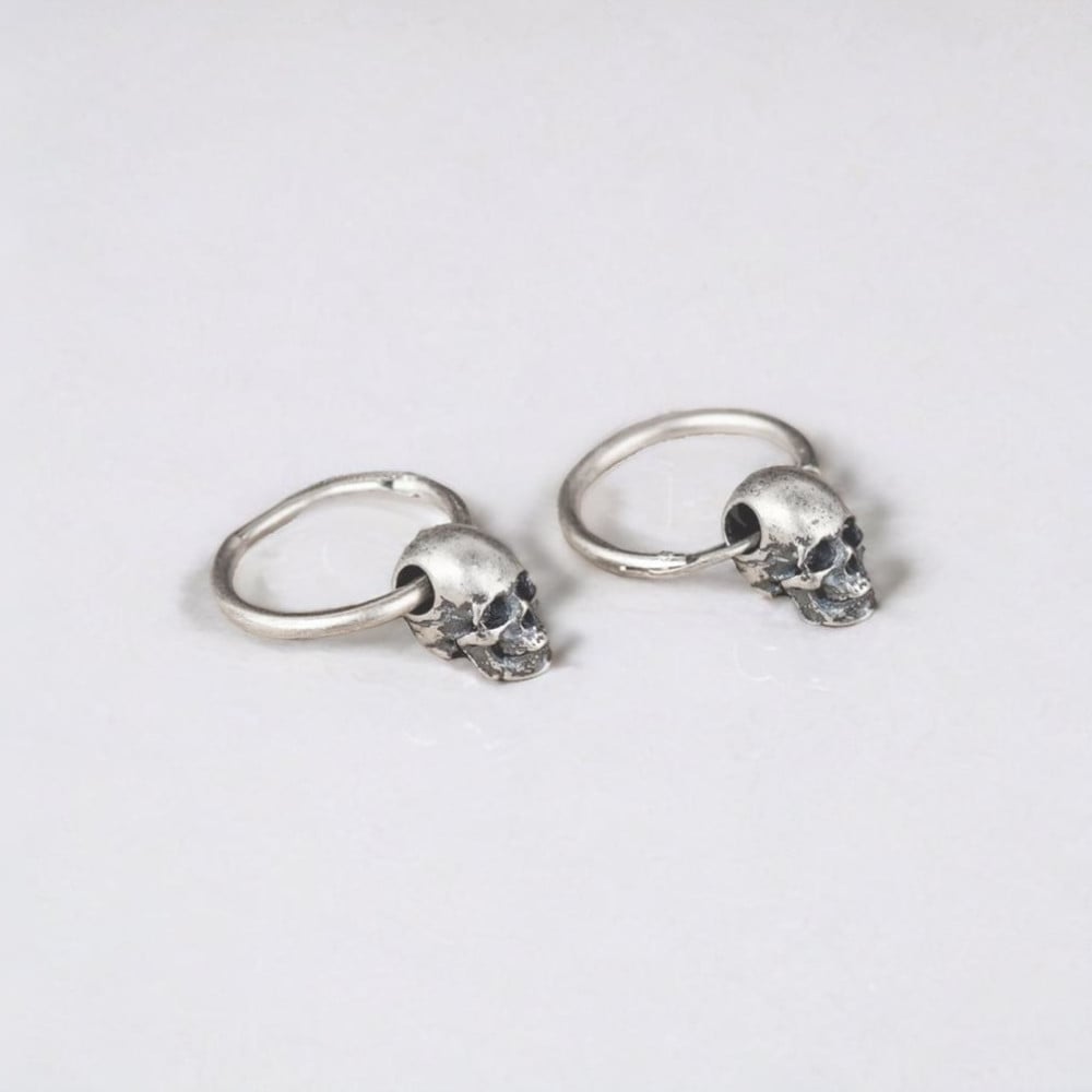 Boucles d'oreilles homme creoles tete de mort argent