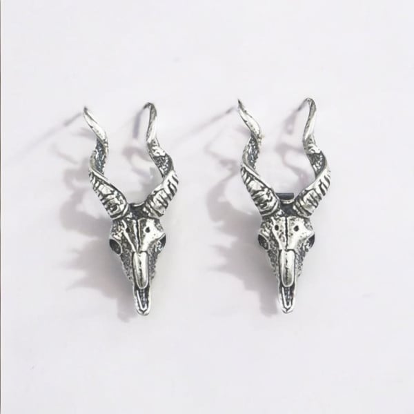 Boucles d'oreilles clous crane de chevre argent homme