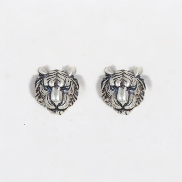 Boucles d'oeilles homme clous tigre argent