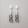 Boucles d'oreilles pendantes ceramique noire infini - paire