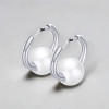 Boucles d'oreilles creoles boule ceramique noire finition polie - paire