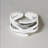 Women's open silver crossed lines ring