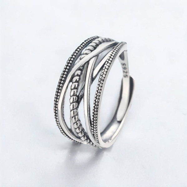 Anello aperto con linee in argento da donna