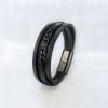 Bracelet cuir tresse multi cordons croix fermoir acier