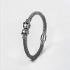 Bracelet homme cuir tresse tete de mort acier noir