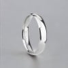 Customizable titanium wedding ring with polished dome