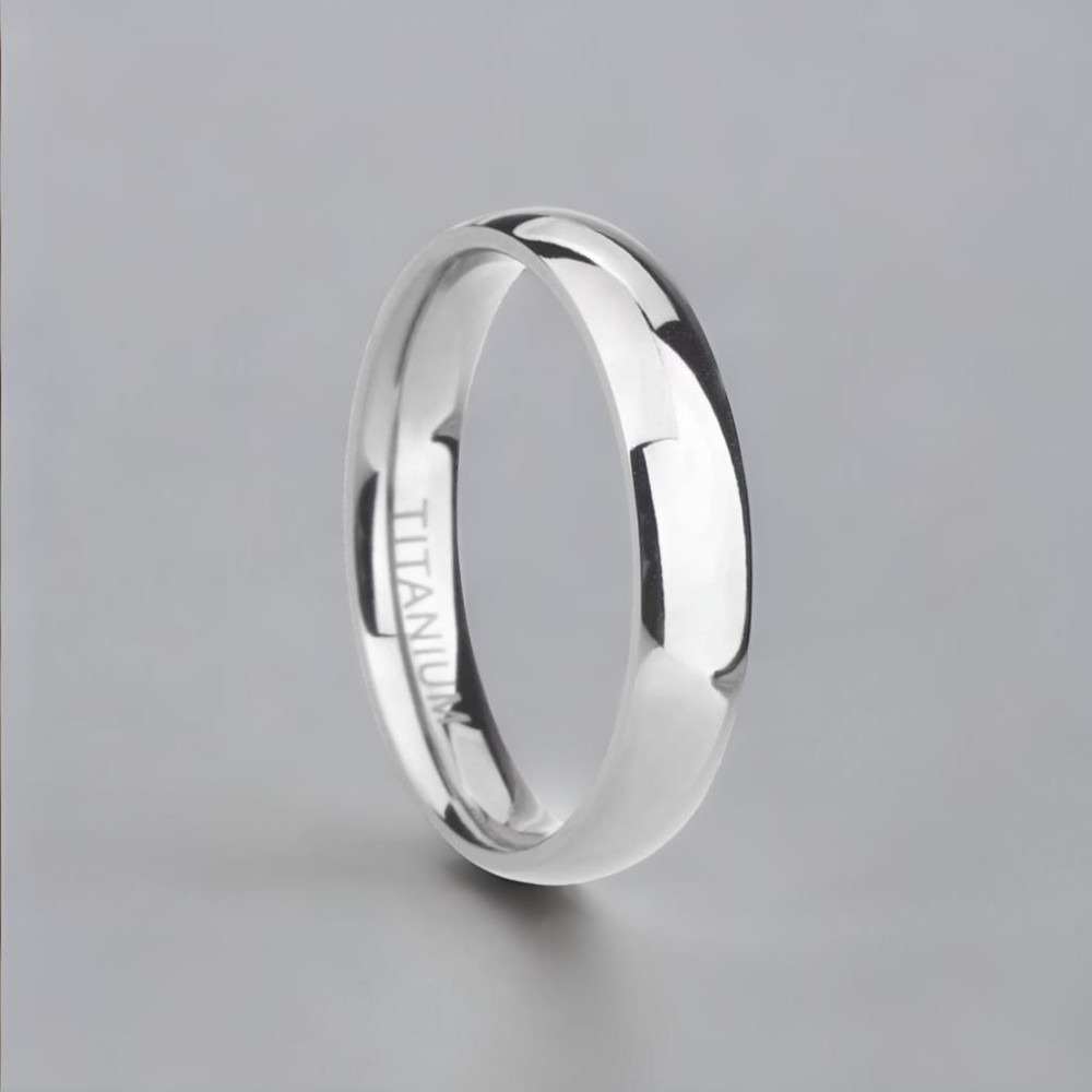 Customizable titanium wedding ring with polished dome